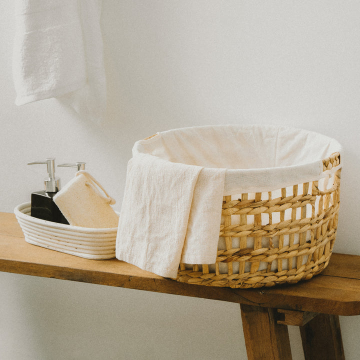 Round braided wicker storage basket set of 5 in various sizes, ideal for organizing laundry, toys, and home essentials from Artera Home