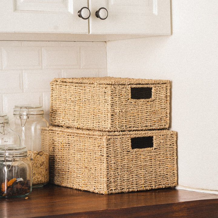 rectangular-seagrass-woven-storage-baskets-with-handles-stacked-up-together