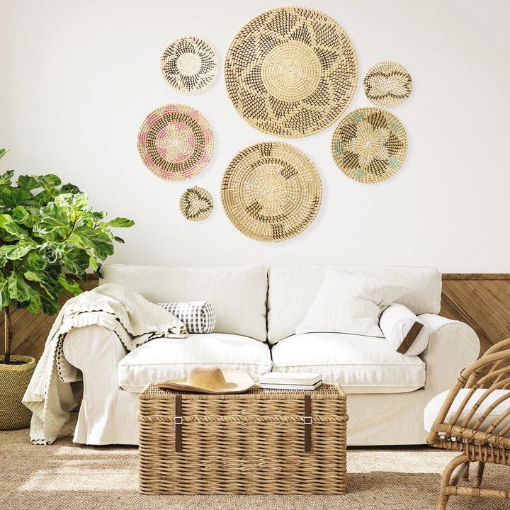 Wall basket decor set of 7 with mixed colors placed above a couch