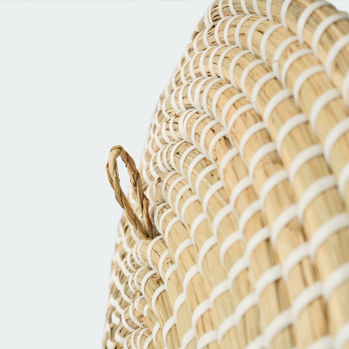 Handcrafted woven wall baskets with simple, elegant patterns