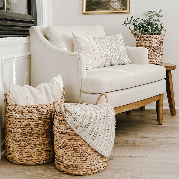 Three Hyacinth Planters of varying sizes holding plants and home items from artera home