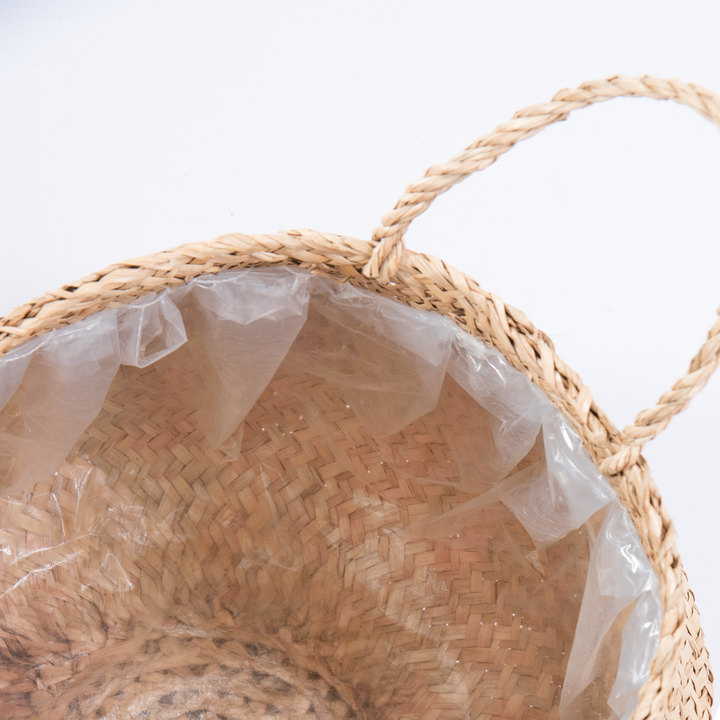 A close-up look at neutral seagrass wicker vase planter