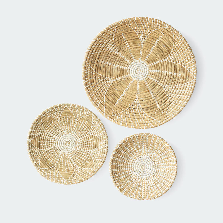 Artera Home round seagrass wall basket decor set of 3 with a white floral pattern