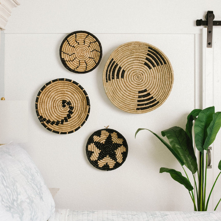 Set of 4 black seagrass wall baskets from Artera Home, perfect for vibrant wall decor