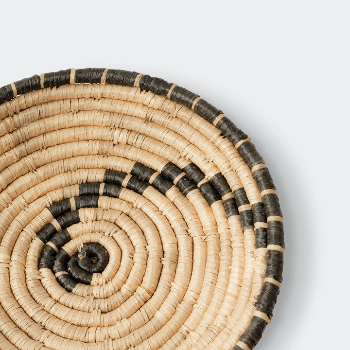 Set of 4 black seagrass wall baskets from Artera Home, perfect for vibrant wall decor