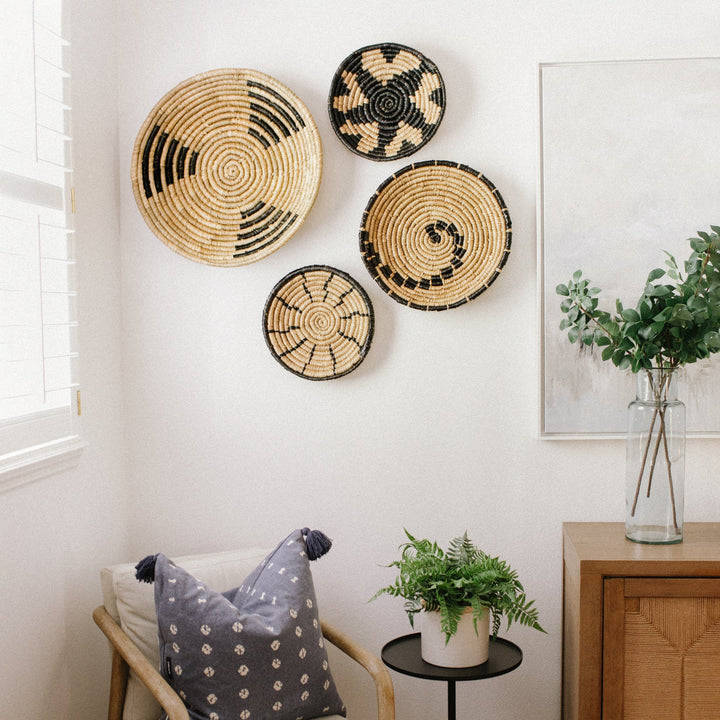 Set of 4 orange seagrass wall baskets from Artera Home, perfect for vibrant wall decor