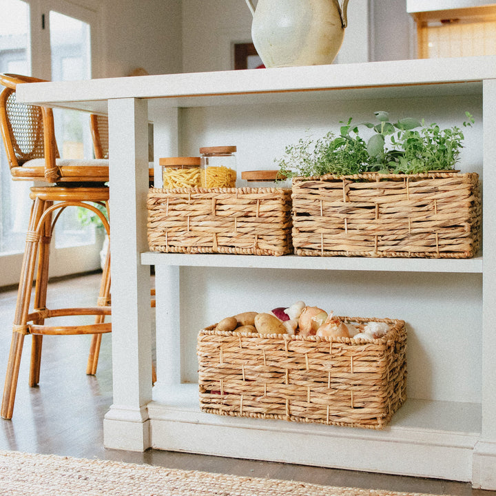 A rectangular twisted water hyacinth wicker storage basket