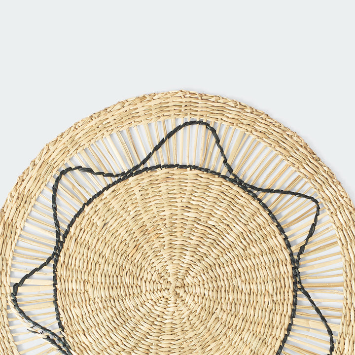 Set of 6 round wicker placemats with black sun-like thread design
