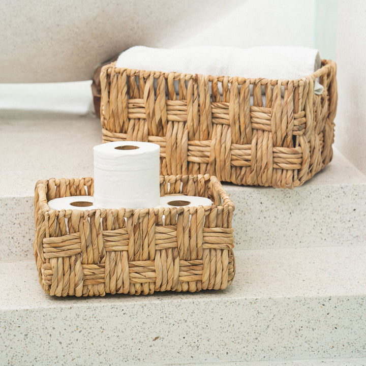 Small wicker storage basket set with books and kitchen items from Artera Home