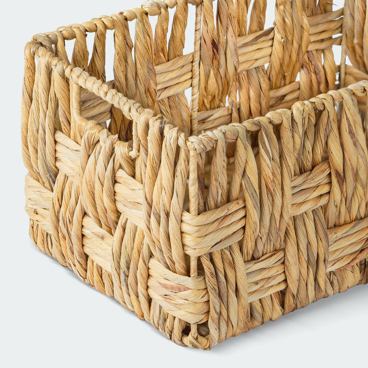 Small wicker storage basket set with books and kitchen items from Artera Home