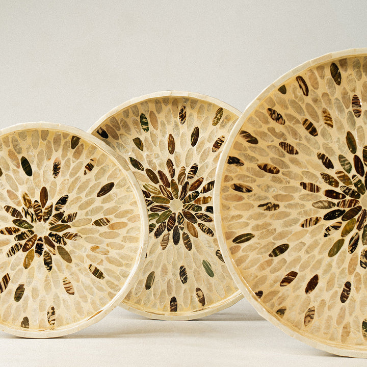 3-floral-mother-of-pearl-wicker-trays-are-arranged-in-a-standing-position-next-to-each-other