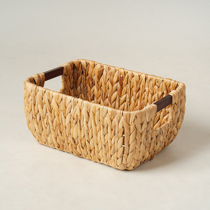 A slide look at a rectangle arrow water hyacinth wicker storage basket with wooden handles