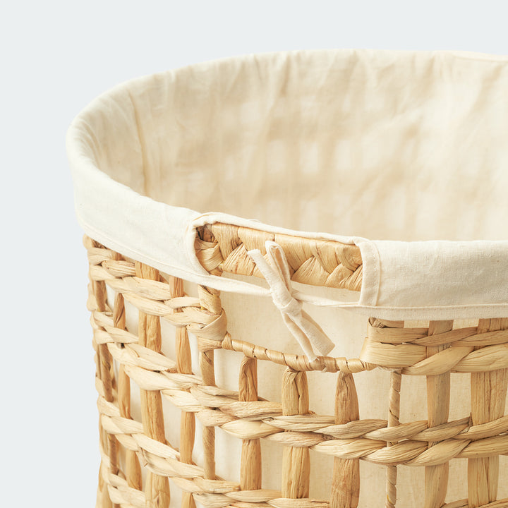 Round braided wicker storage basket set of 5 in various sizes, ideal for organizing laundry, toys, and home essentials from Artera Home